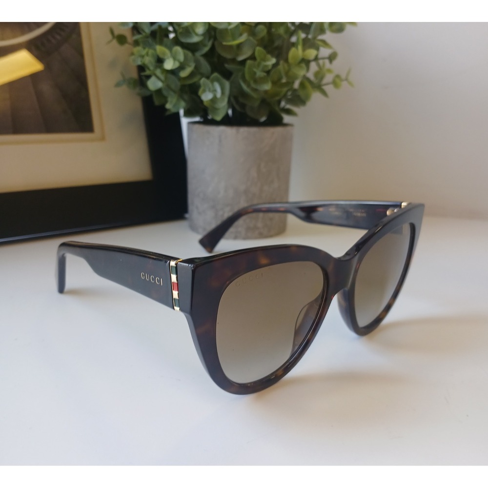 Gucci Tortoiseshell Cat Eye Sunglasses with Gold Accents